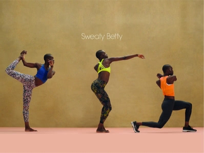 Sweaty Betty campaign image with people doing stretches.